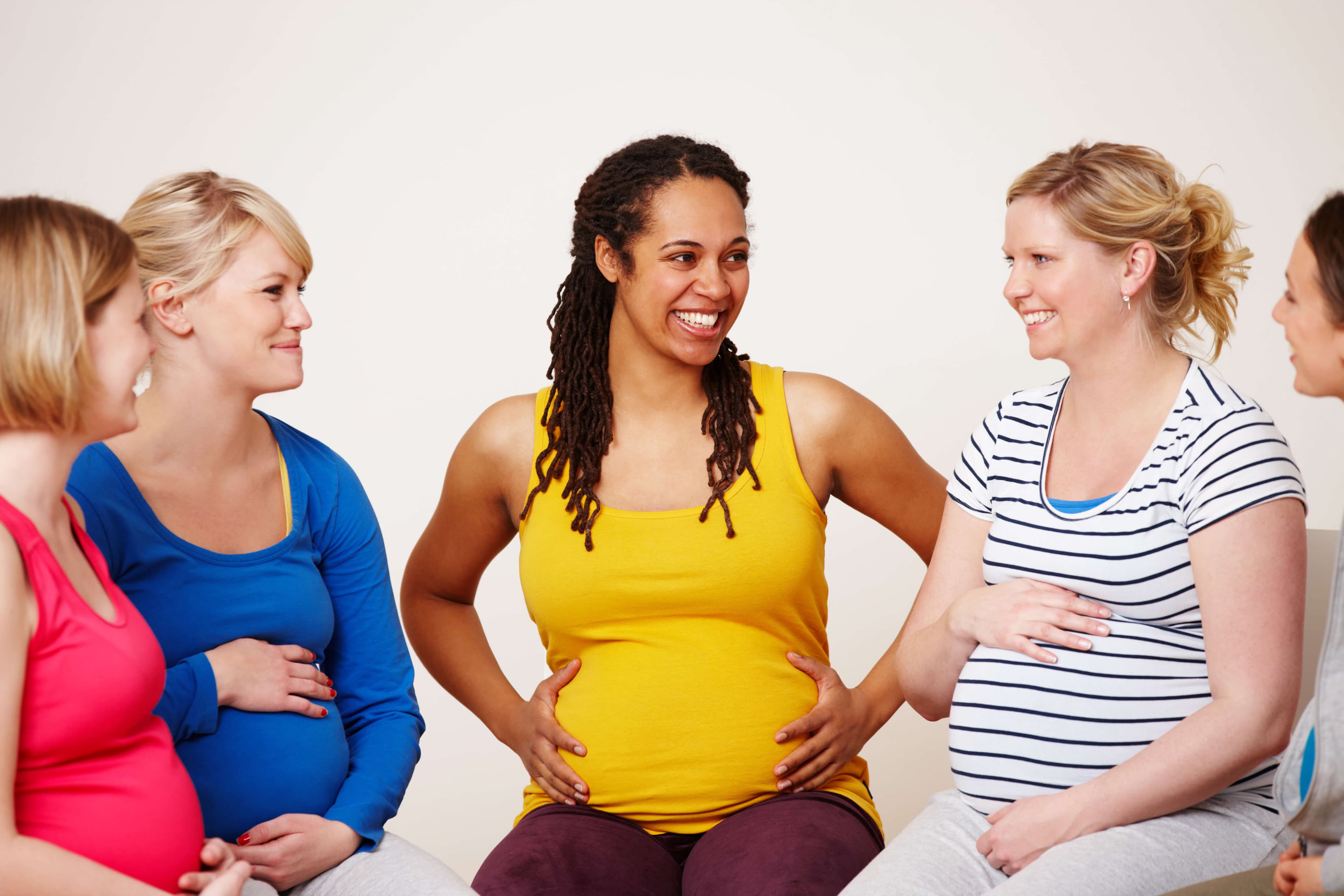 Two friends supporting each other through their pregnancies